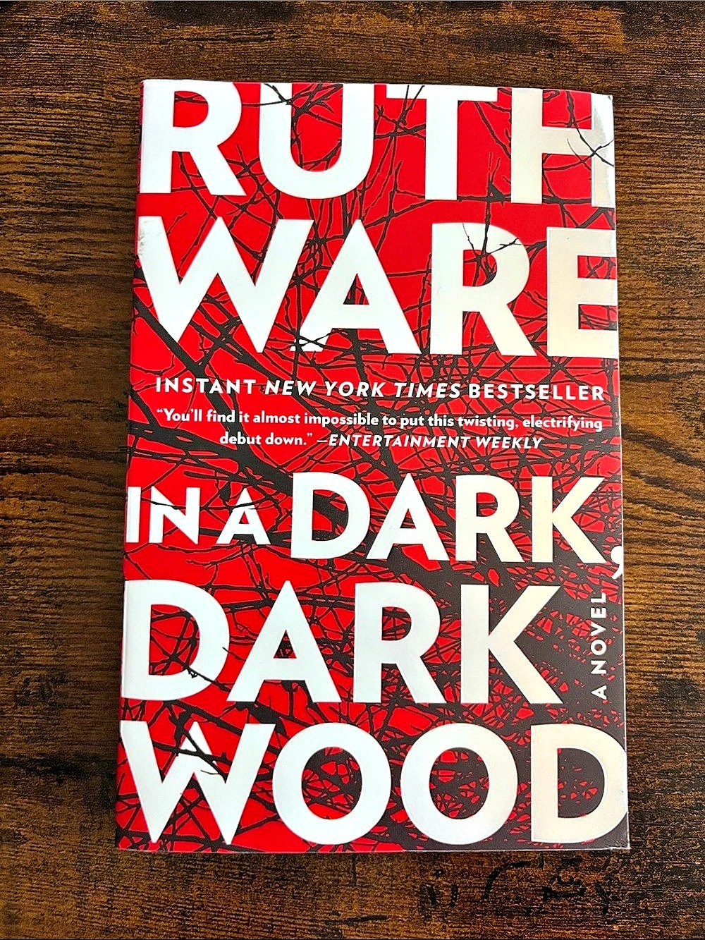 In a Dark, Dark Wood paperback novel
